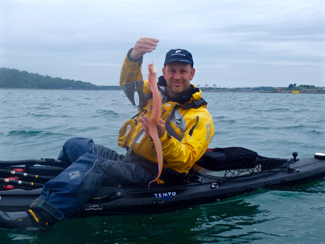 Mark with a Red Band Fish caught on his RTM Black Tempo