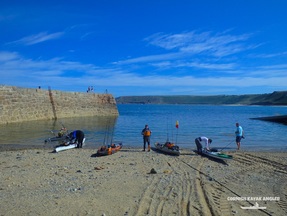 Kayak Fishing at Sennen - Launching on a calm summers day