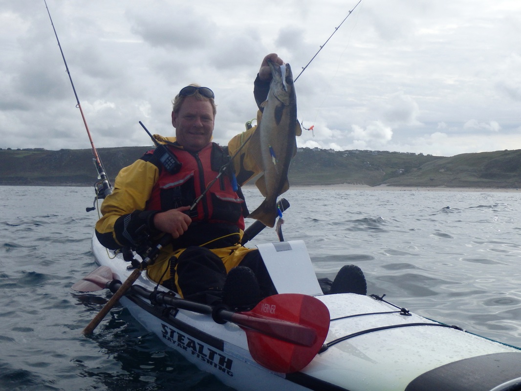 Craig with a Pollack at the Penzance Kayak Fishing Meet 2015