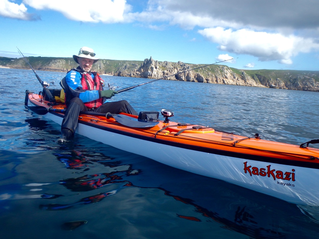 Richard kayak fishing at Porthcurno