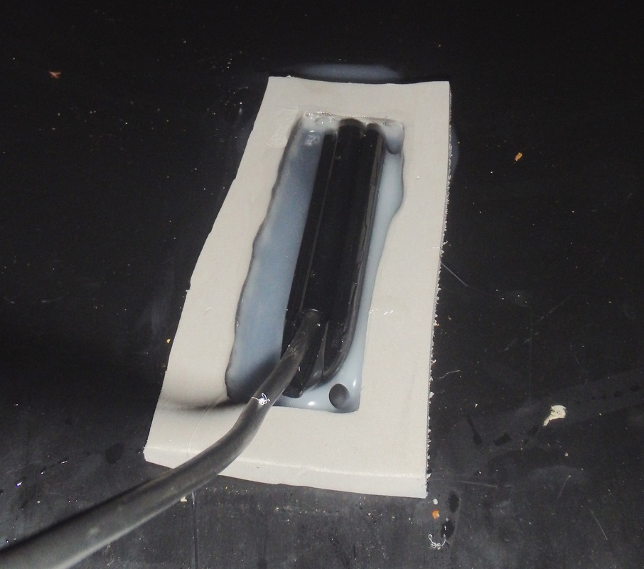 Installing a fishfinder transducer inside the hull of a kayak